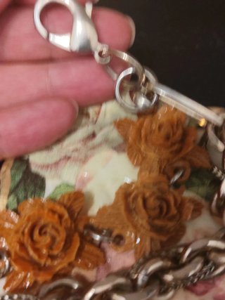 Pulsera Massimo Dutti Flores Marrones y metal.
