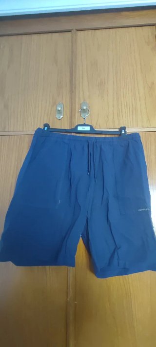 Pantalón corto azul hombre con cordones