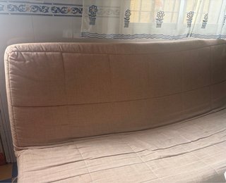Sillón-cama beige y marrón