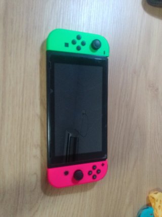 PACCHETTO Nintendo Switch + Accessori + Gioco