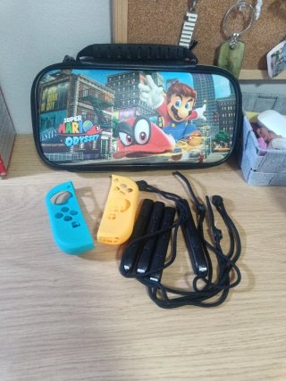 PACCHETTO Nintendo Switch + Accessori + Gioco