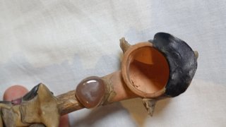 Figura artesanal madera y minerales
