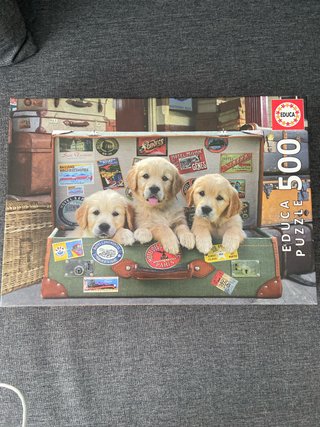Puzzle 500 piezas cachorros en maleta