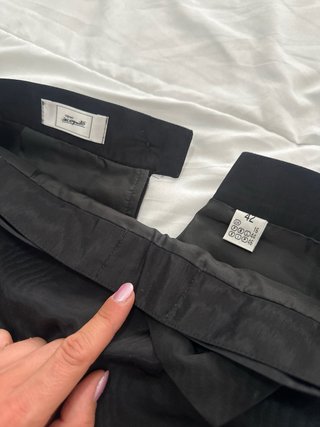 Falda tubo negra con detalle hebilla
