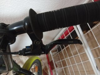 Bicicleta verde poco uso, acepto cambios