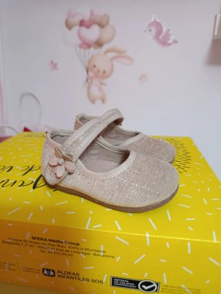 Zapatos de bebé con flor