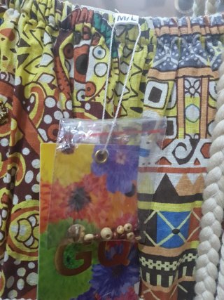 Vestido largo con estampado étnico y flecos