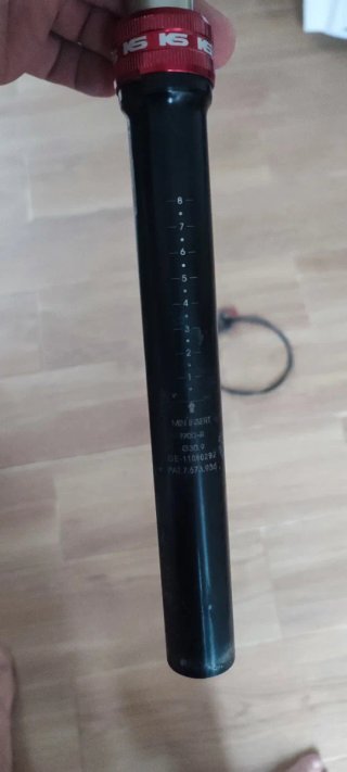 Tija telescópica