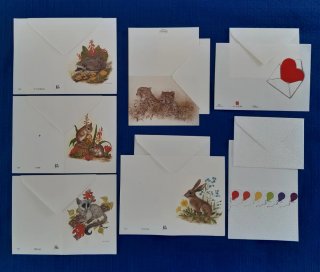 Lote hojitas y sobres tipo postal