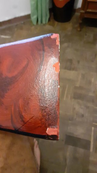 Jarrón alto de cerámica negro y rojo ver defecto