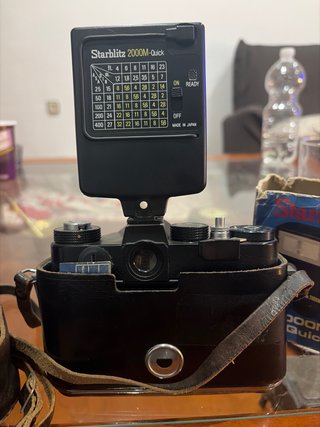 Cámara Zenit TTL con flash Starblitz y funda