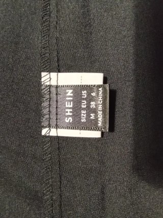 Conjunto chaleco y pantalón corto negro