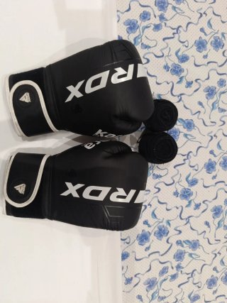 Equipaje de boxeo (Guantes y vendas)