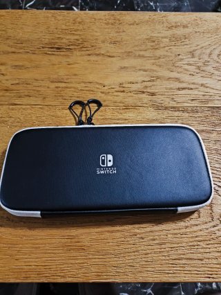 Nintendo Switch OLED + 128GB + funda + accesorios