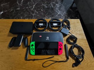 Nintendo Switch OLED + 128GB + funda + accesorios