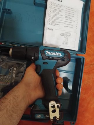 Taladro Makita HP333D con cargador y batería