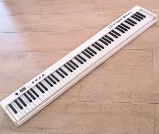 Piano digital 88 teclas plegable blanco