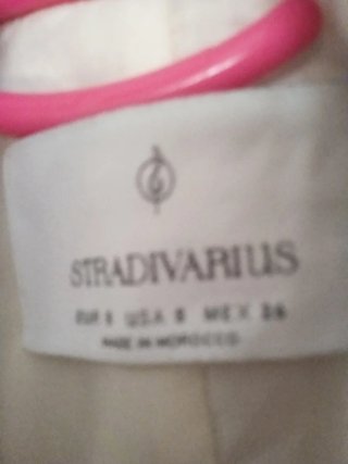 Chaleco largo / brazer crema Stradivarius