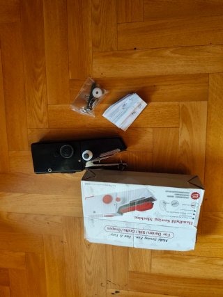 Máquina de coser de mano portátil
