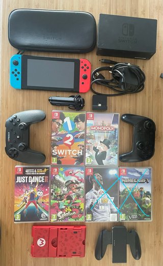 Nintendo Switch + Accesorios y Juegos