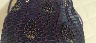 Bolso de fiesta morado con pedrería