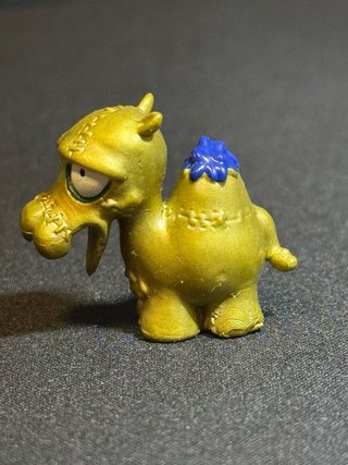 Zomlings Serie 2 Jamel Dorado Ultra Raro Oro #210