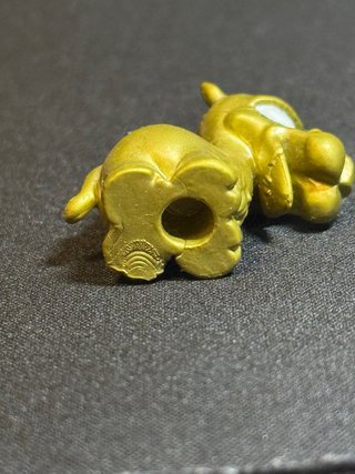 Zomlings Serie 2 Jamel Dorado Ultra Raro Oro #210