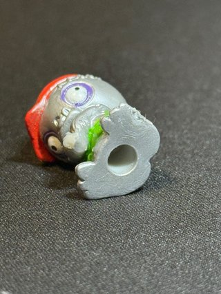 Zomlings Serie 1 Plateado - Heavy Z #105 (Ultra Ra