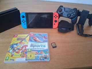 Nintendo Switch + Accesorios y Juegos