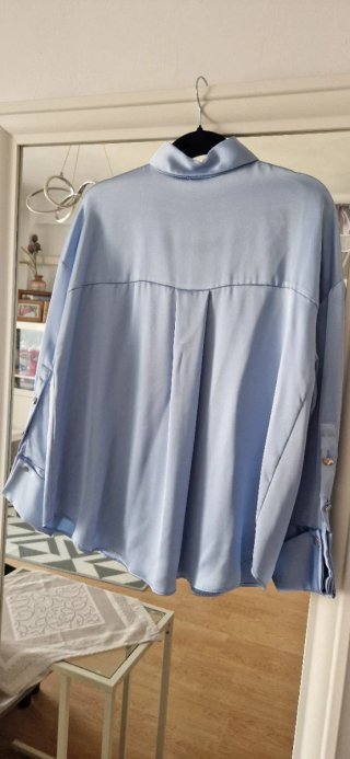 Blusa satinada azul