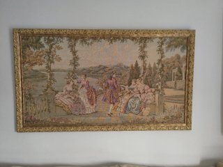 Tapiz de época con marco dorado