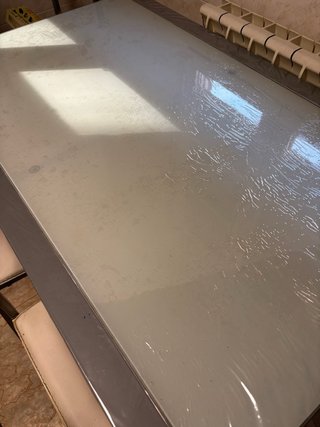 Mesa de cristal con 4 sillas