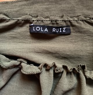 Top verde con volantes