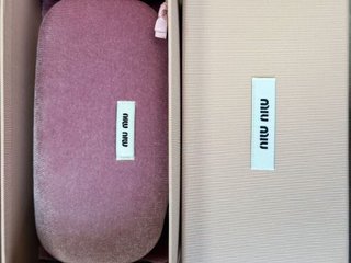 Gafas de sol Miu Miu sin montura doradas