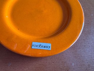 Piccoli piatti in ceramica arancione vintage