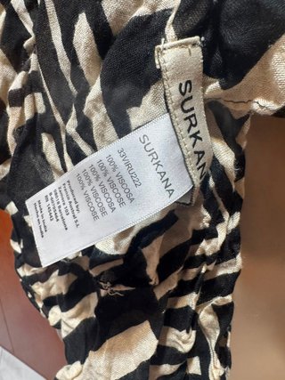 Sciarpa fantasia geometrica beige e nera