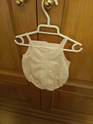 Vestiditos y ranitas para bebé