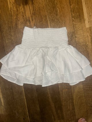 Falda blanca volantes