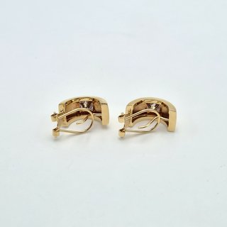 Pendiente de oro de 18k con piedras. 2.92 gr.