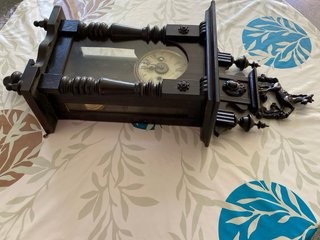 Reloj de pared con péndulo