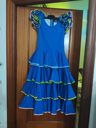 Traje de flamenca azul volantes