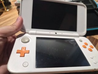 Nintendo 2DS XL Blanca y Naranja + Juegos