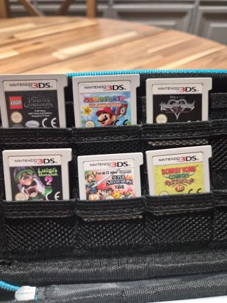 Nintendo 2DS XL Blanca y Naranja + Juegos