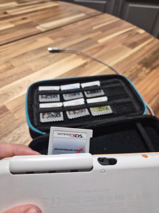 Nintendo 2DS XL Blanca y Naranja + Juegos
