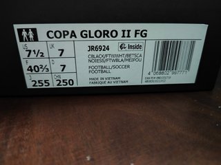 Botas de fútbol Adidas negras y rojas