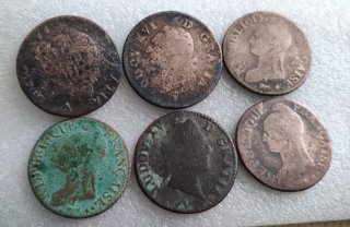 monedas antiguas de cobre de los siglos
