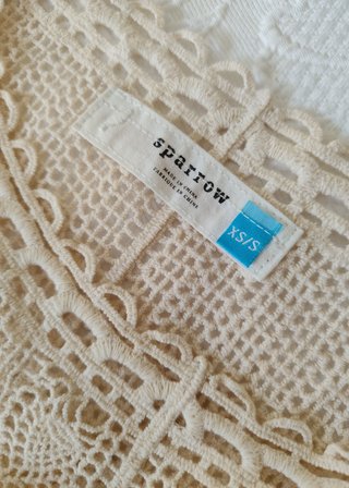 Poncho de crochet de Anthropologie. Talla XS/S