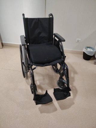 Silla de ruedas + colchón antiescara