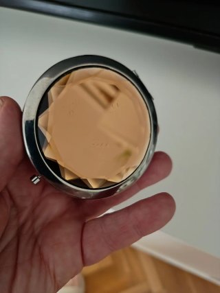 Espejo de bolso biselado dorado y naranja