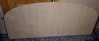 Cabecero de madera curvo
